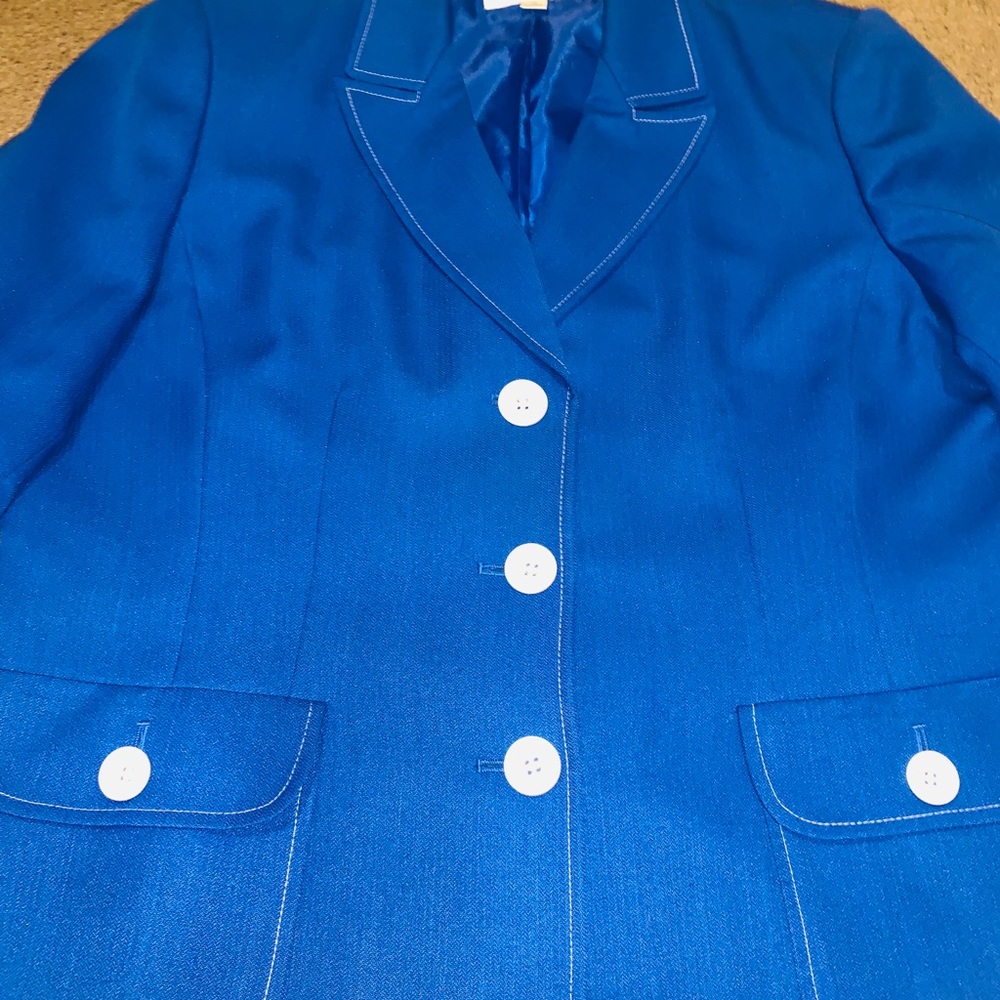 Royal blue blazer with white buttons